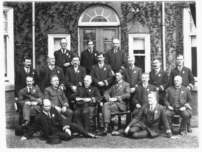 Photograph of the West Hartlepool Special Constables, taken around 1914. All the men seem to be quite affluent by their dress.  Their only badge of office appears to have been their black and white armband and a small badge worn on the left lapel.